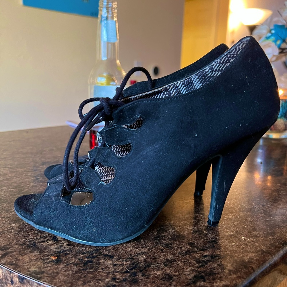 Worn Black Heels